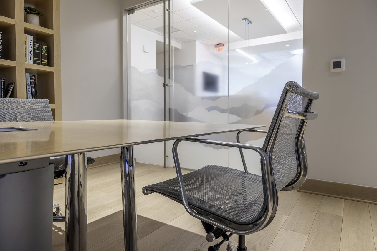 Office interior with glass partitions
